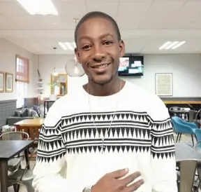 Barista from Zimbabwe works in Coffee Shop in Mauritius